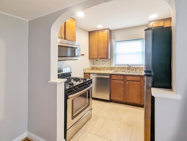 Kitchen with Stainless Steel Appliances - 2822 Victoria Ave