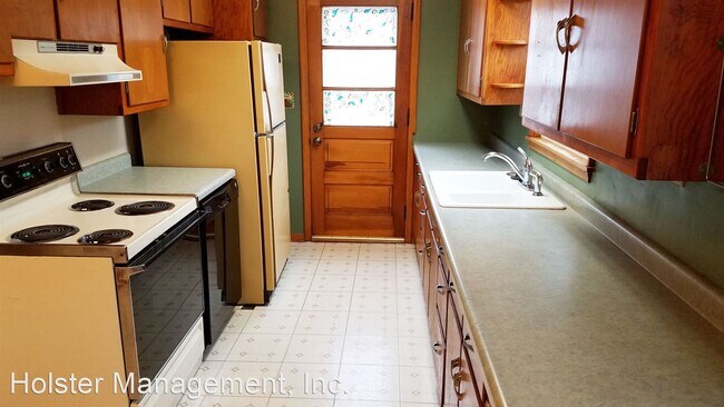 Building Photo - 4 br, 1.5 bath House - 213 N 10th Avenue