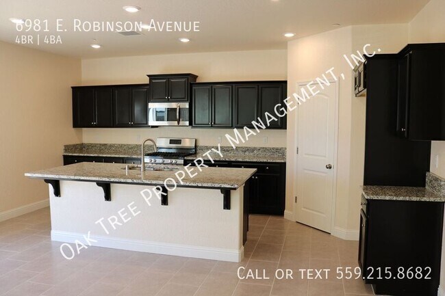 Foto del edificio - 6981 E Robinson Ave