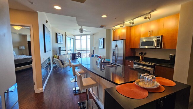 Building Photo - ***GORGEOUS FURNISHED 1 BEDROOM CONDO AT A...