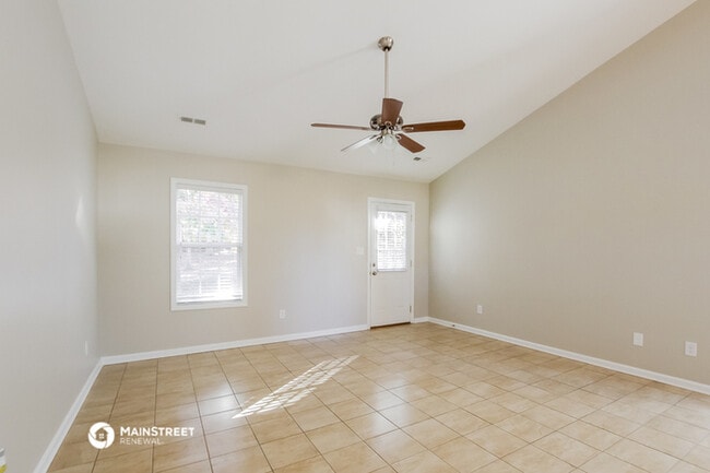 Building Photo - 7034 Windsong Way