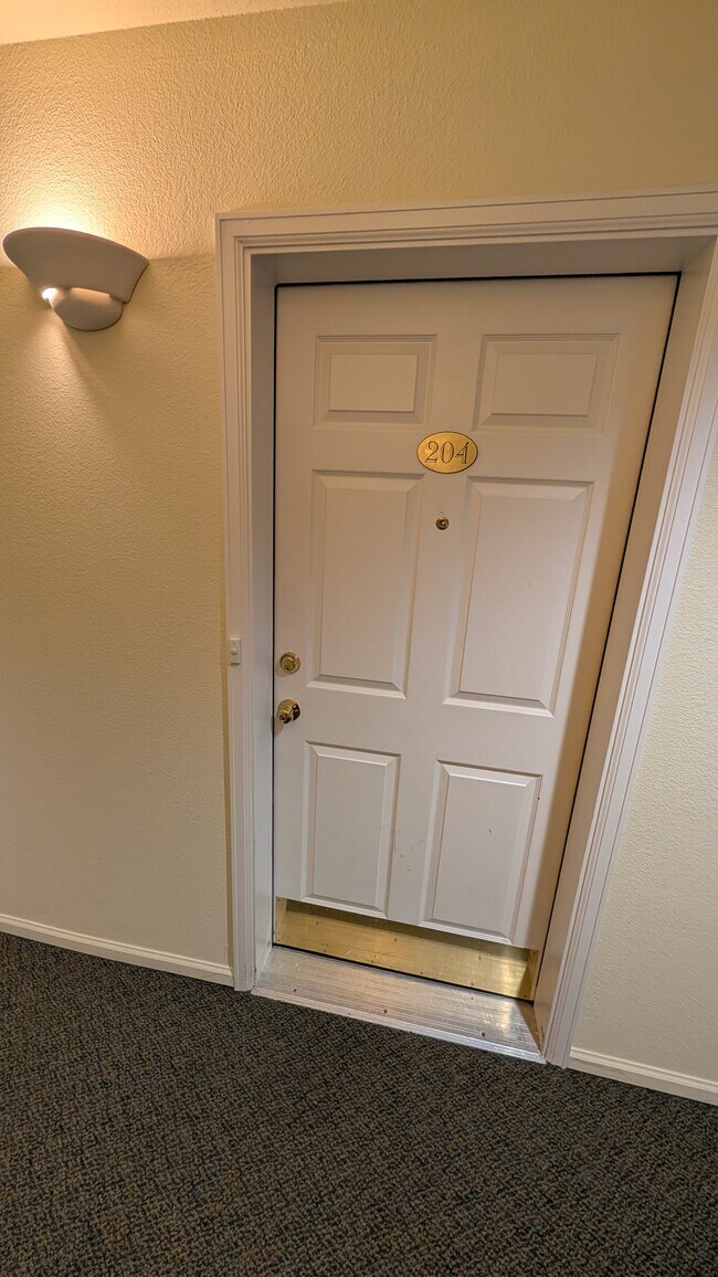 Front door to apt - 2894 W Riverwalk Cir