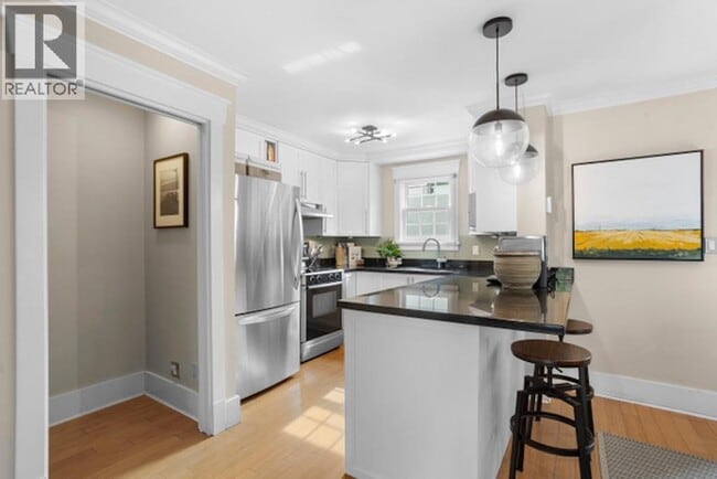 Photo du bâtiment - 1365 W 7th Ave