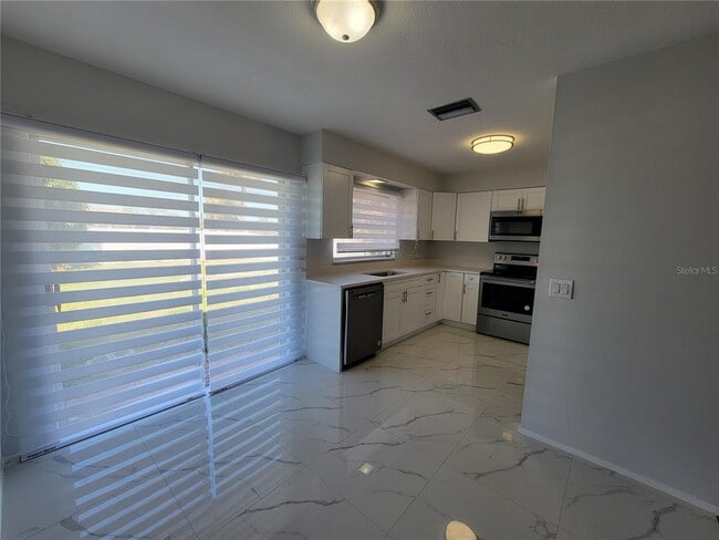 Building Photo - 3413 Port Charlotte Blvd