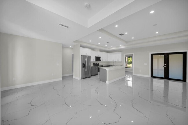 Foto del edificio - Brand-New Home in Lehigh Acres – Move-In Ready! FL 33974. Qualify for a deposit-free option and s...