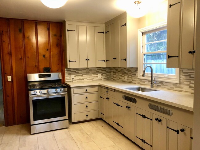 Building Photo - Delightful and Charming Home Tucked Away o...
