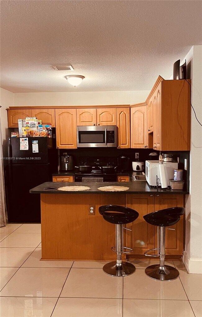 Foto del edificio - 5857 NW 13th Ave
