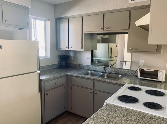 Building Photo - PENDING APP! Unfurnished Long Term Condo! Xanadu Condos!