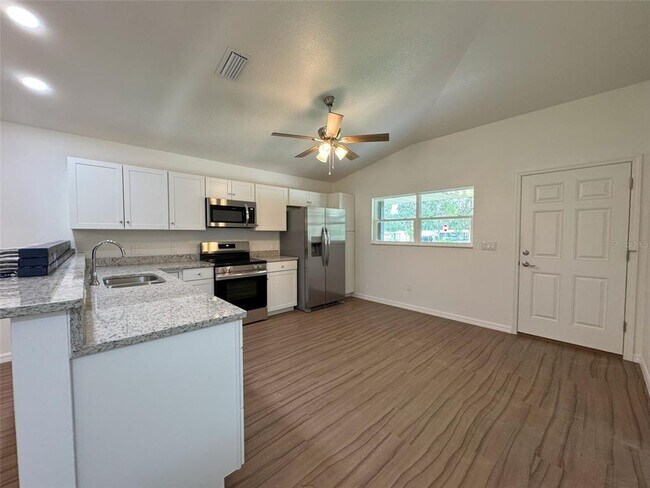 Foto del edificio - 8800 E Ogden Ln
