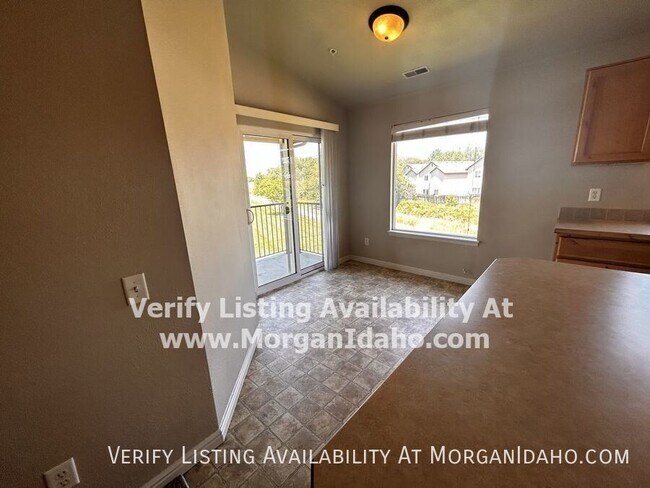Building Photo - Upstairs with covered parking, large bath,...