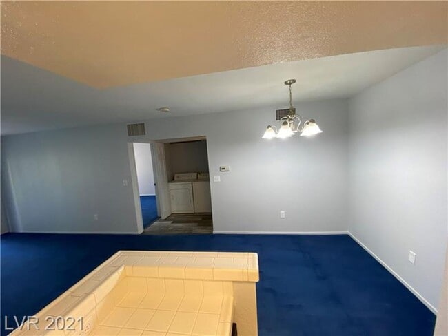 Building Photo - Cozy 1-Bed Condo in Gated 89128 Community ...