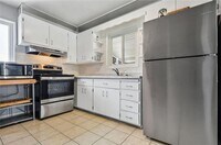 Updated Brick Ranch with Gorgeous Finishes & Ideal Location!