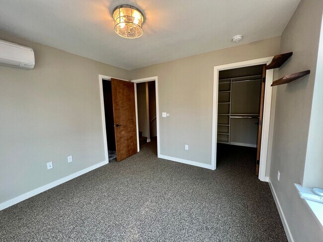 Building Photo - Modern Greenwood Townhome - Just Reduced Monthly Rental Rate