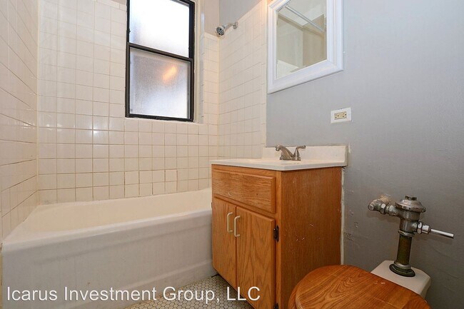 Foto del edificio - 7001-7007 S Merrill Ave