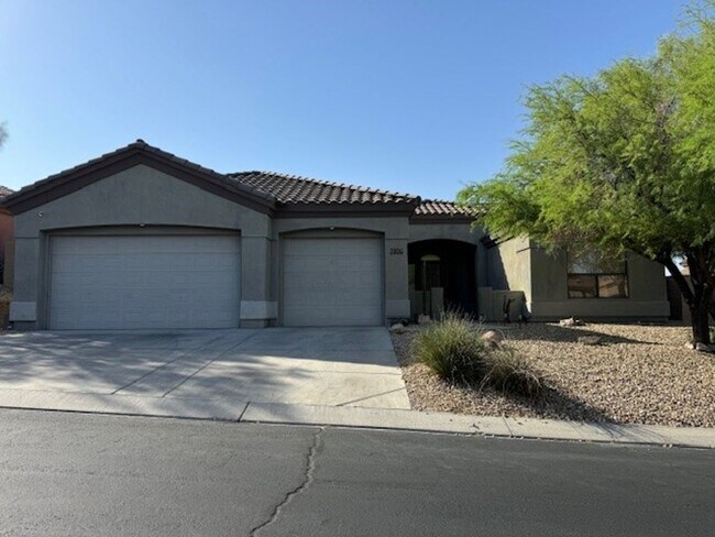 Building Photo - Laughlin Ranch 3 BR Large fenced Yard, 3 car-Boat Deep Garage Gated Entry on Parkway