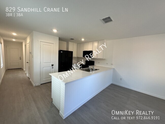Foto del edificio - 829 Sandhill Crane Ln
