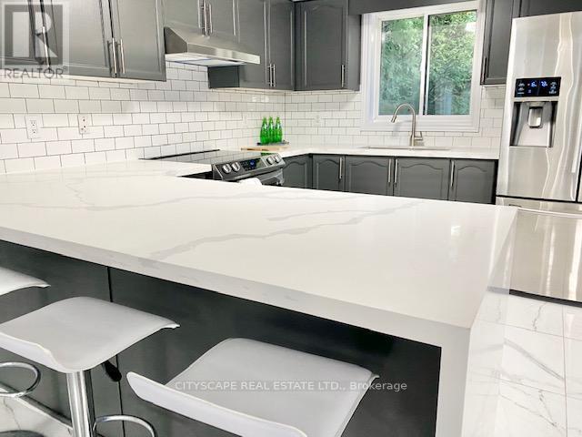 Photo du bâtiment - 169 Cumming Dr