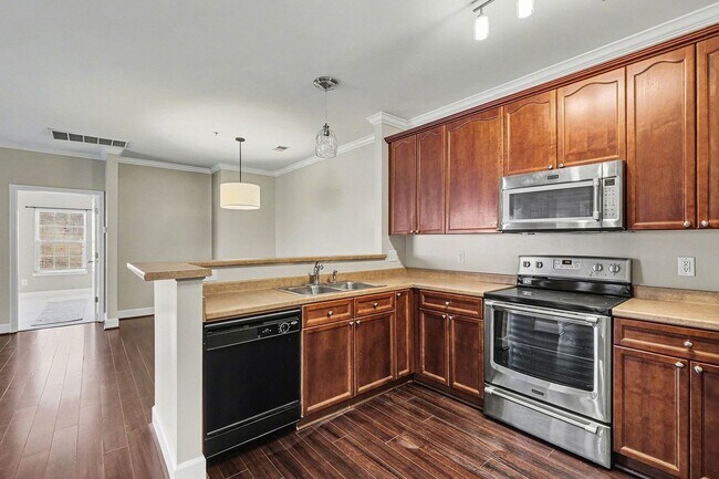 Building Photo - Spacious and light-filled second-story condo!