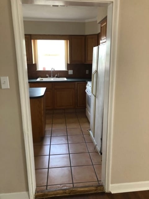 View from Dining room into kitchen - 606 W Duncan Ave