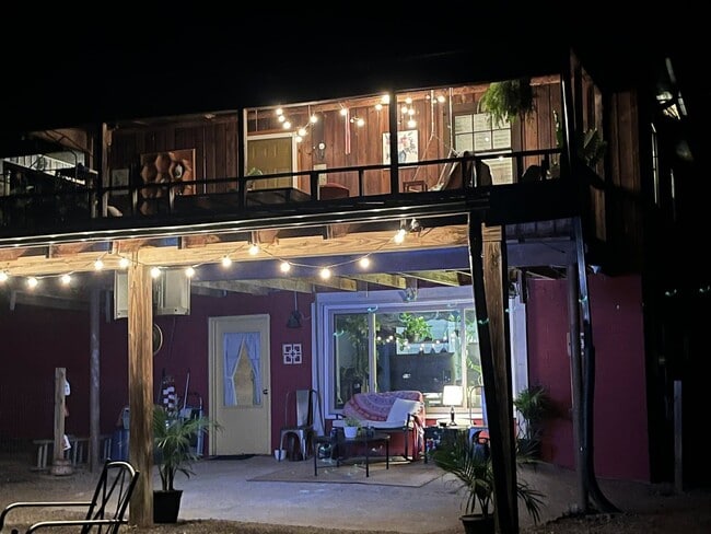 Back view of cover porch and lower level space - 3393 Mobile Rd