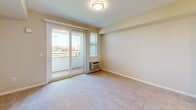 Located at 431 El Camino Real in Santa Clara, CA, this thoughtfully designed single-floor unit makes excellent use of its compact footprint. The open living area features plush wall-to-wall carpeting, neutral beige walls, and a flush ceiling light fixture, creating a calm and welcoming atmosphere. A sliding glass door leads to a private balcony, filling the space with natural light and offering open outdoor views.

The galley-style kitchen is a standout feature, equipped with rich cherry wood cabinetry, granite-look countertops, and a full suite of stainless steel appliances including a refrigerator, electric range, over-the-range microwave, and sink. Warm wood-look flooring runs through the kitchen and hallway, providing a clean contrast to the carpeted living area.

The bathroom is finished with neutral stone-tile flooring, a full soaking tub with shower, a vanity with mirror cabinet, and overhead lighting — offering a clean and functional layout. A dedicated closet and hallway provide practical storage and efficient circulation throughout the unit.

Overall, this space presents a cohesive, move-in-ready environment with functional finishes, ample natural light, and a well-organized layout suited for comfortable everyday living in the heart of Santa Clara.