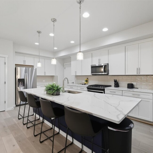 Foto del edificio - 5809 Spring Breeze Dr