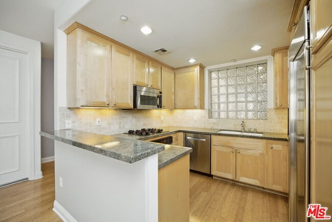 Building Photo - 2125 S Bentley Ave