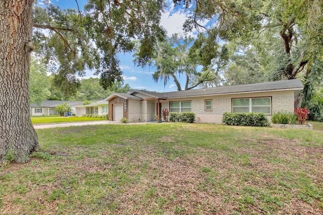Photo - Gorgeous Waterfront 3/2 Mid-century Modern Style Home with a Covered Patio and a Large Backyard i...
