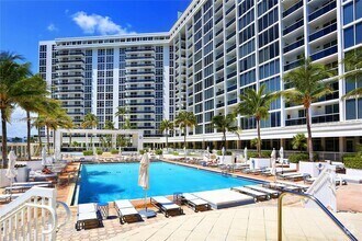 Building Photo - 10275 Collins Ave