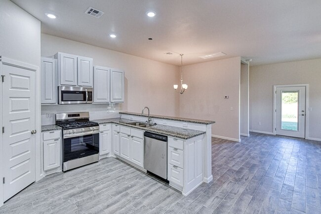 Building Photo - Brand New Construction! Lawn care provided!