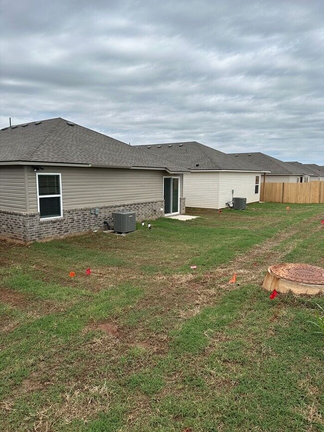 Building Photo - Now Available: Spacious 3-Bedroom, 2-Bath Home in Yukon—Don't Miss Out!
