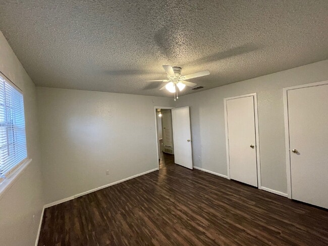 Building Photo - Updated South Lubbock Duplex — Spacious 2BD/1.5BA with Private Yard & Modern Finishes