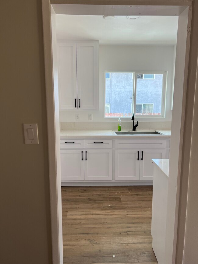 Kitchen from hallway - 411 N Idaho St