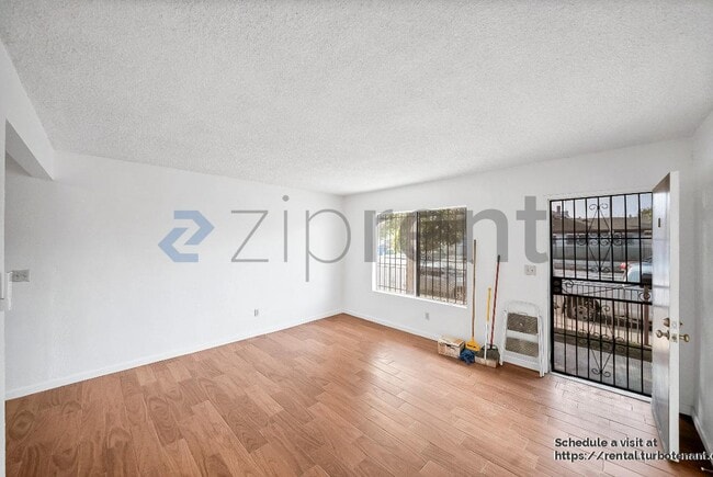 Building Photo - 2458 Normandie Ave