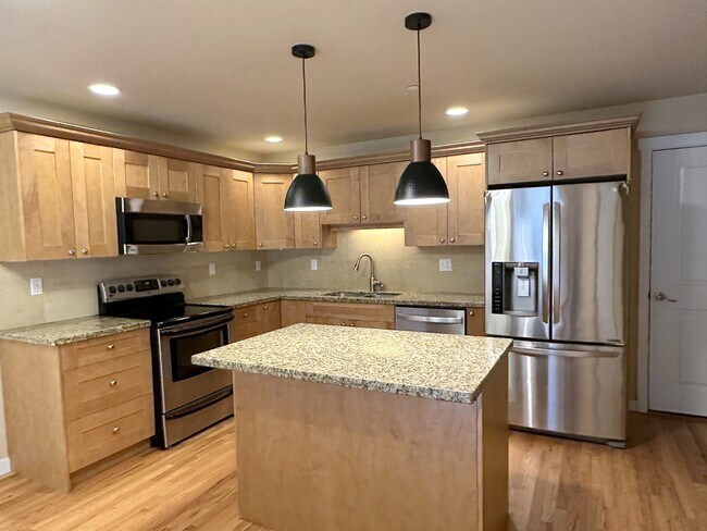 Granite counter tops, stainless steel appliances - 210 NW 1st St