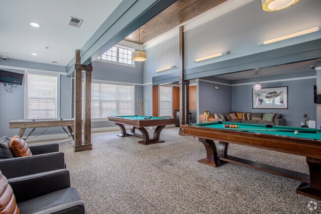 Clubhouse with Billiards & Air Hockey - The Nest at 4955 Apartments