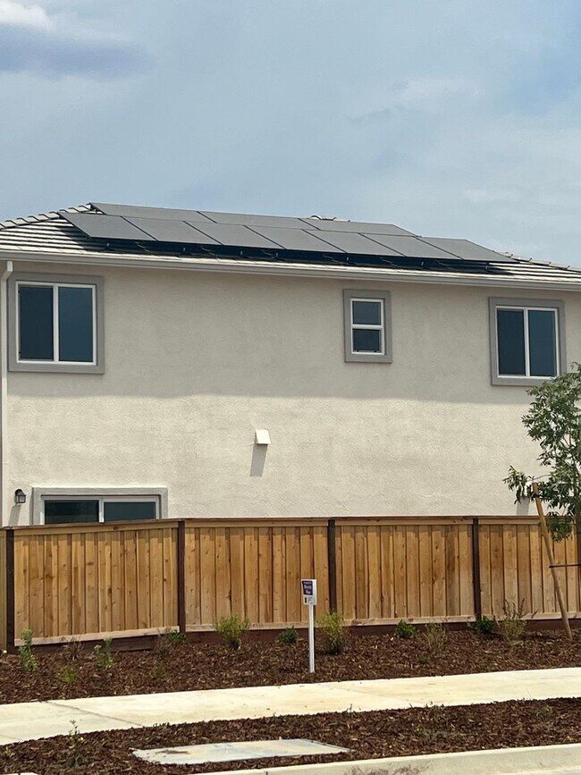 Building Photo - Brand new home with Next-generational living.