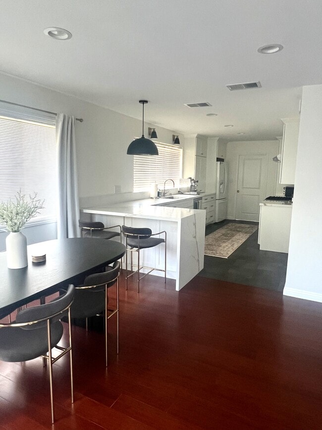 Dining area with bar seating at peninsula - 26247 Ocean View Ave