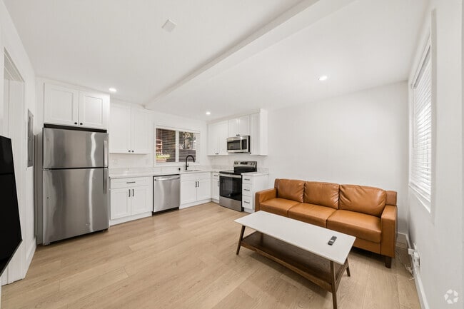 3BR, 1BA - 692SF - Living Room - 12 Panoramic Apartments