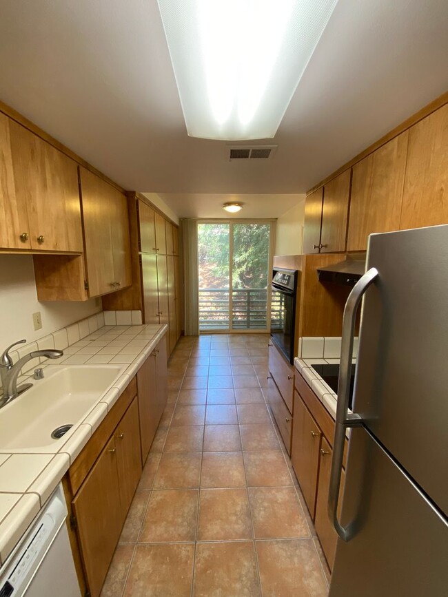Building Photo - Serene Condo in Beautiful Gated Community