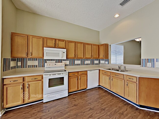 Foto del edificio - 3409 Pebble Sand Ln