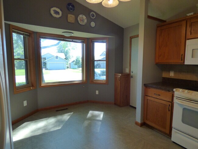 Convenient garage access into kitchen makes it easy to unload groceries - 8475 168th St W