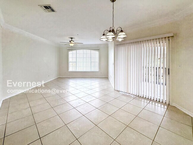 Building Photo - Lovely 2BR Third-Floor Condo in Gated Comm...