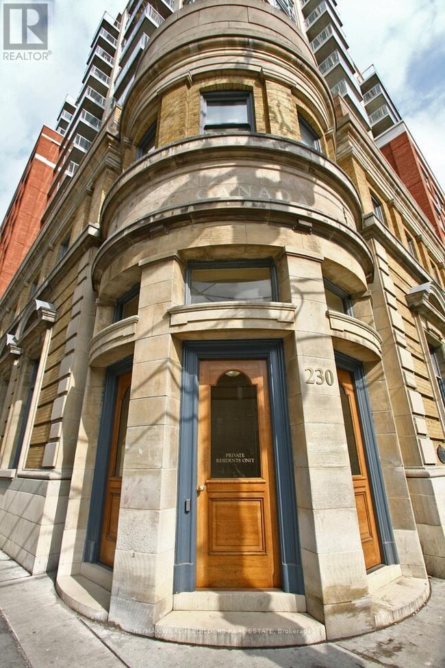 Building Photo - 230-1230 King St E