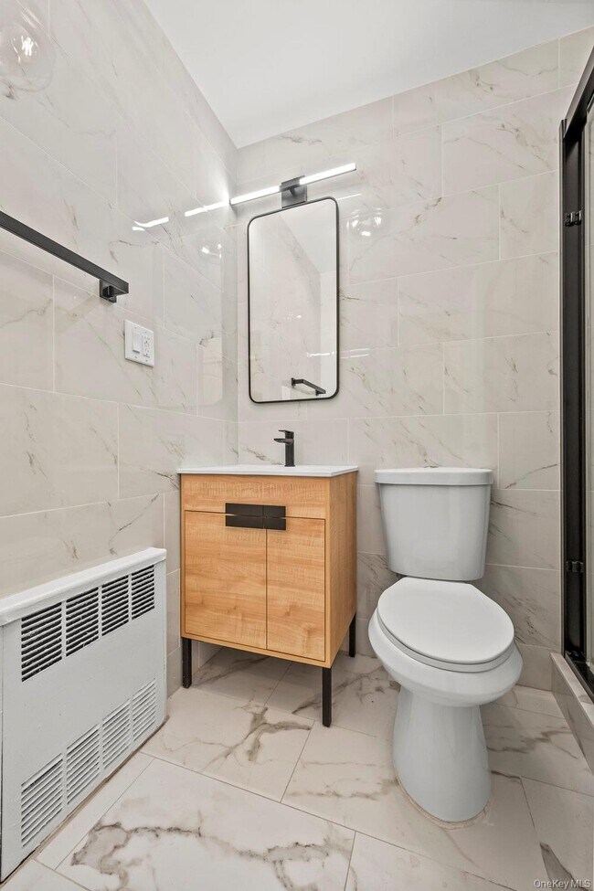 Foto del edificio - 877 E 55th St