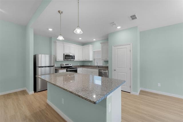 Building Photo - 2027 Bluebonnet Ave