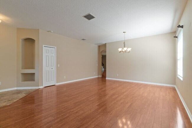 Building Photo - Executive Living Waits!