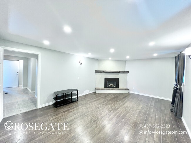 Photo du bâtiment - Spacious 1-Bedroom Basement Apartment in P...