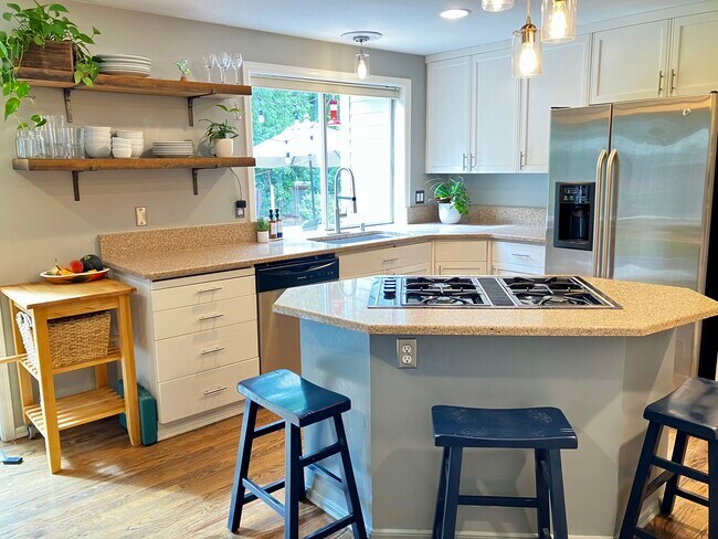 Large Kitchen with Breakfast Nook seating with stools - 4615 191st Pl NE