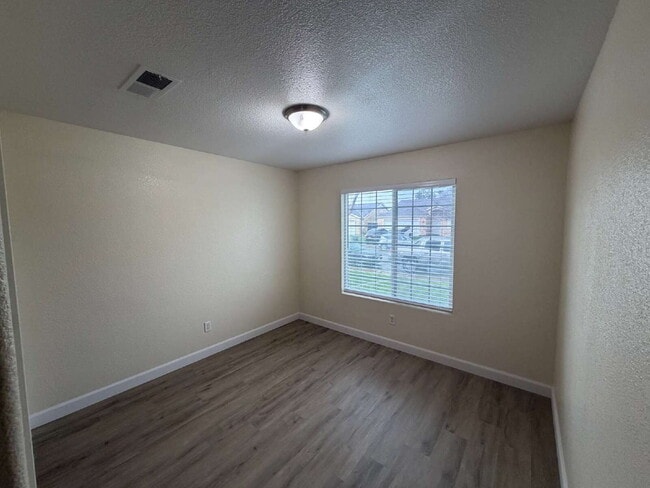 Photo - "Charming 4-Bedroom Gem with 2 Full Baths in Merced – Spacious 1,515 Sq Ft Home on Antley Street!"